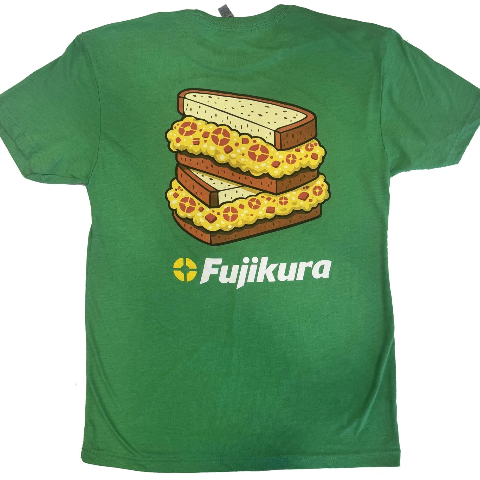 Green tee with a multi-color back print of a stacked sandwich